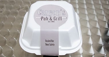 Custom Safety Seal on White Take-Out Container