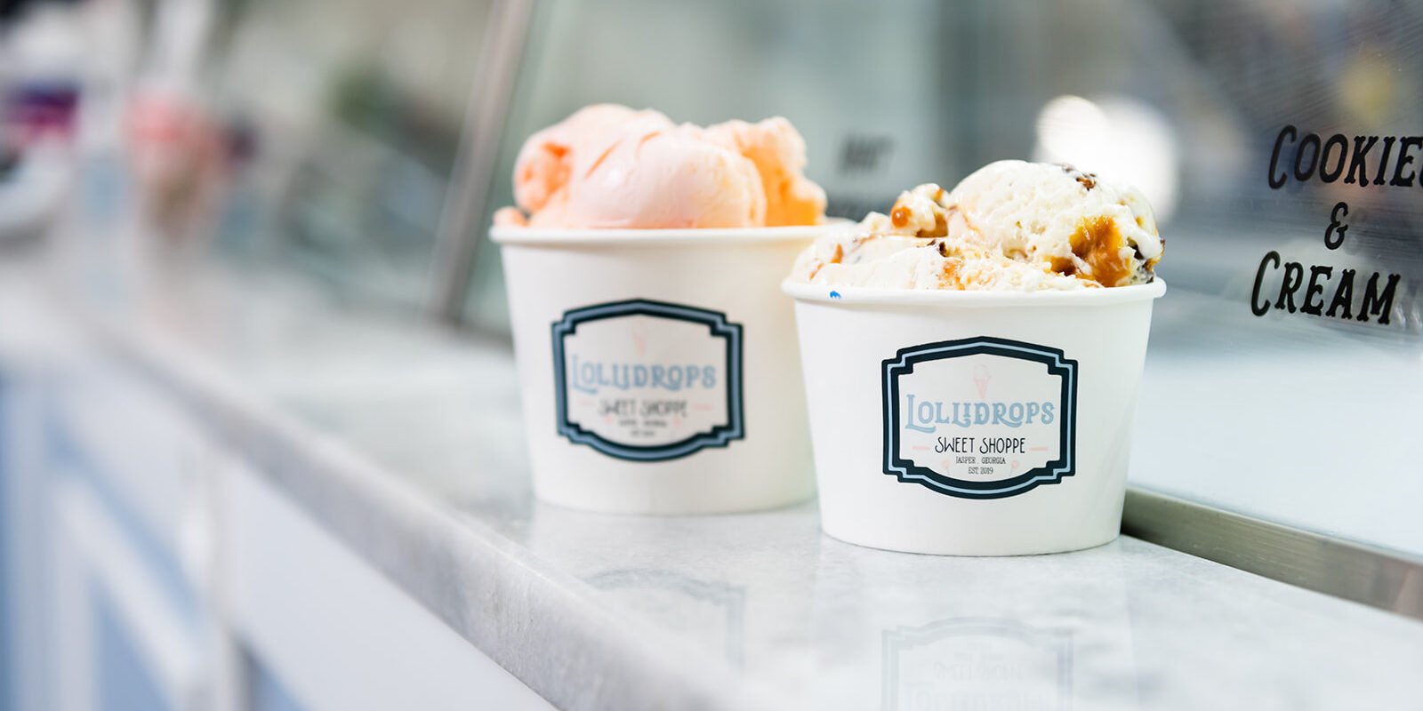 Two dessert cups filled with ice cream