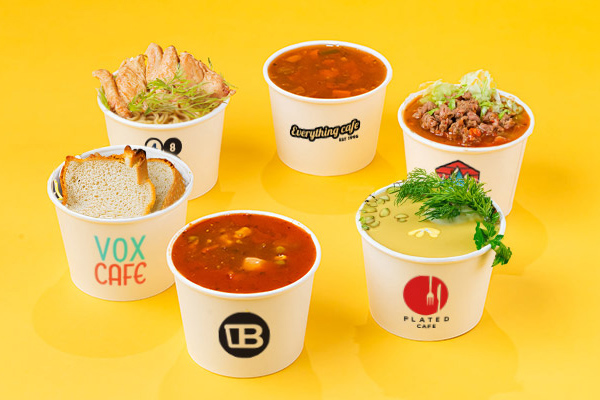 soup3 Six custom printed soup bowls in a circle, containing a variety of soups and garnishes.