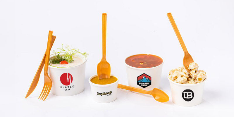soup5 A line of 4 custom printed soup cups filled with 3 soups and 1 pasta salad.