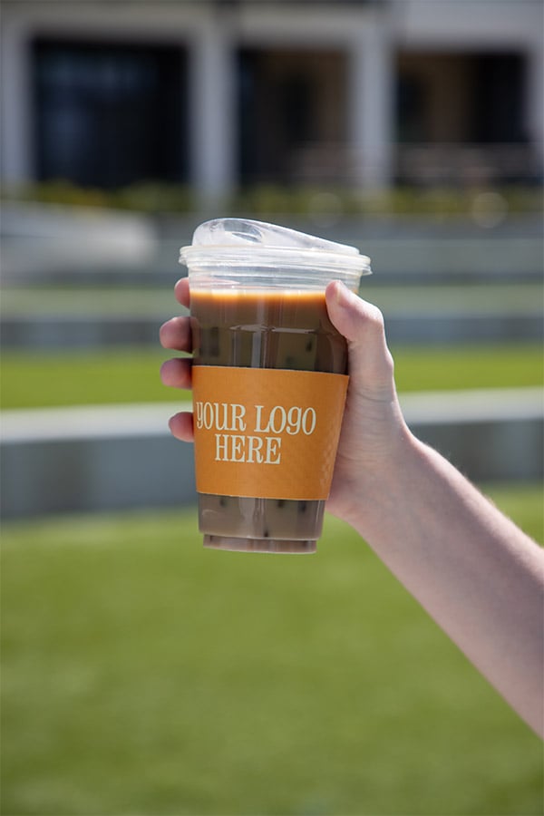 A custom sleeve on a plastic cold cup
