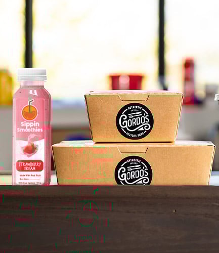 Custom printed labels on paper to-go boxes